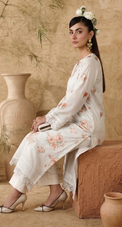 White Breezes embroidered lawn shirt,Emb sleeves and back,Emb lawn dupatta with same trouser
