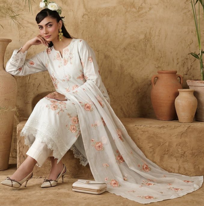 White Breezes embroidered lawn shirt,Emb sleeves and back,Emb lawn dupatta with same trouser